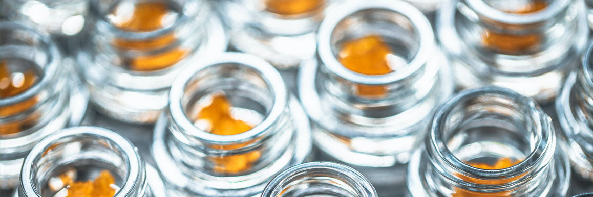 Concentrates in glass jars ready for dabbing